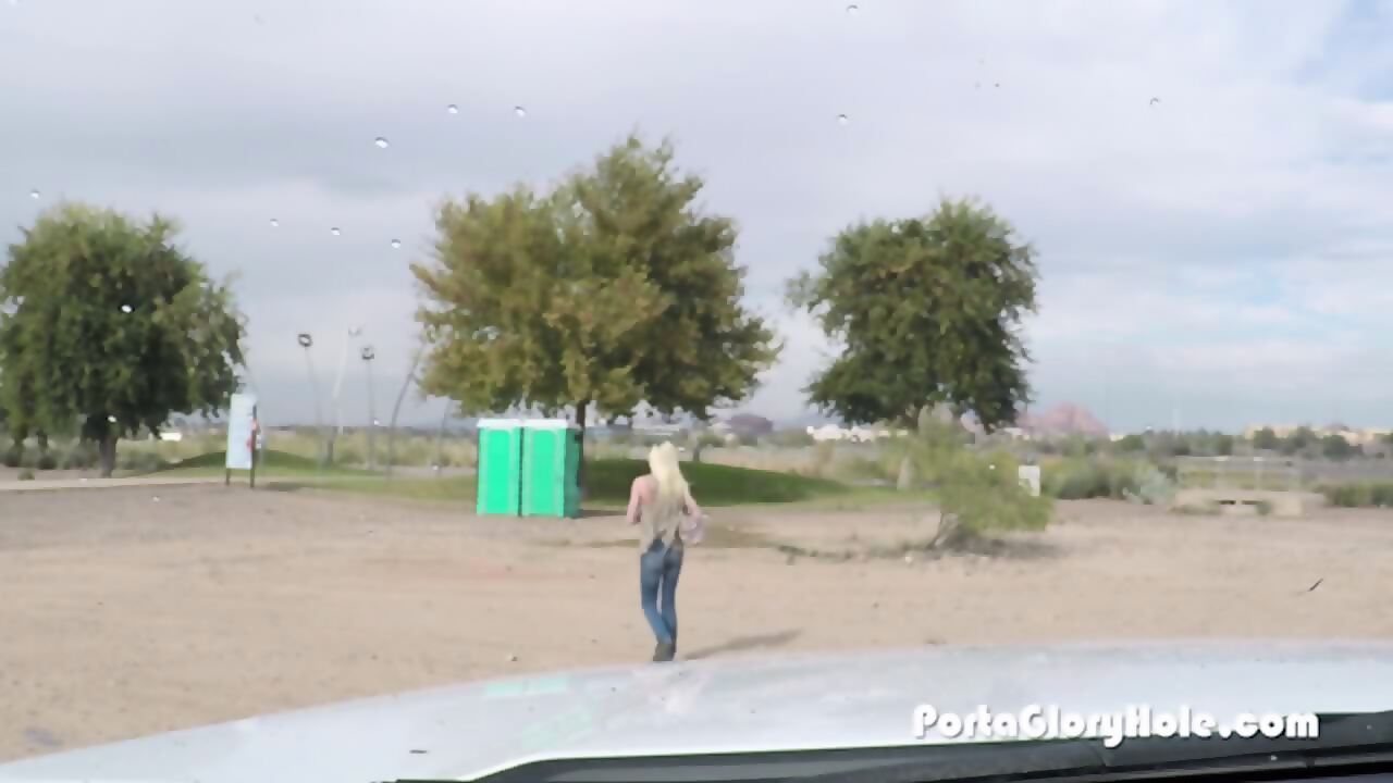 Petite Blonde Sucking Cocks In Public Porta Potty Gloryhole image picture photo