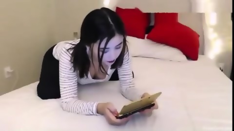 Jb Sister Captions Porn - Cute twin sister Mei Meng lying in bed to play games in ...