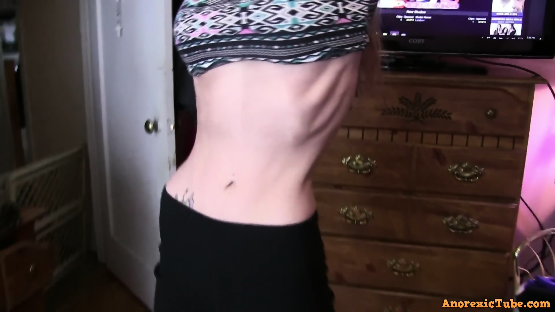 Skinny Girl Showing Ribs photo