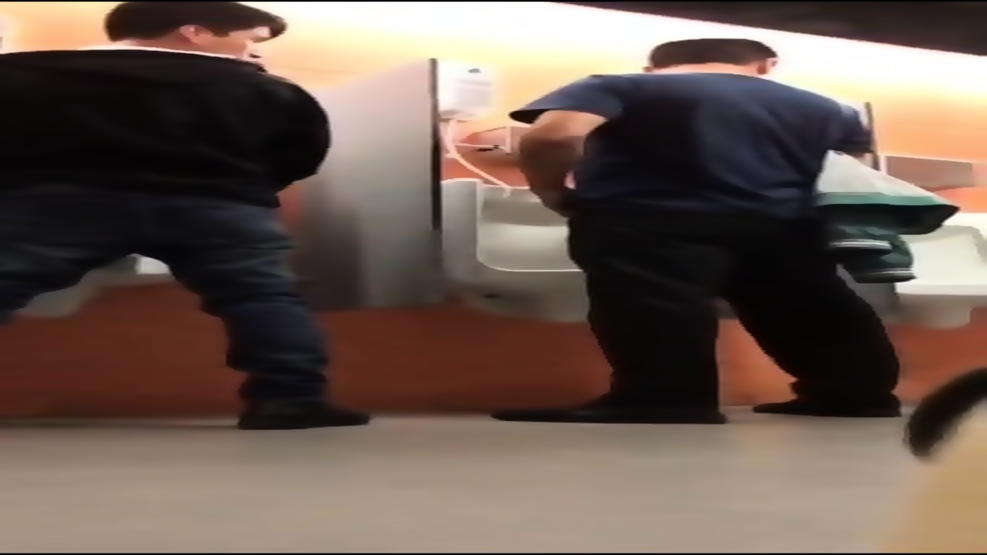 Twink tries to suck a stranger in public toilet but people came picture