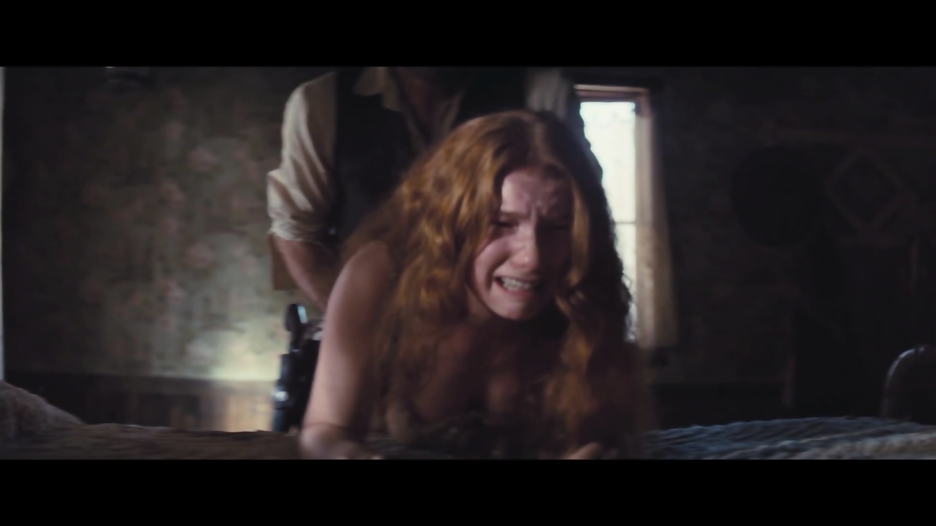 Redheaded girl in sex movie scenes