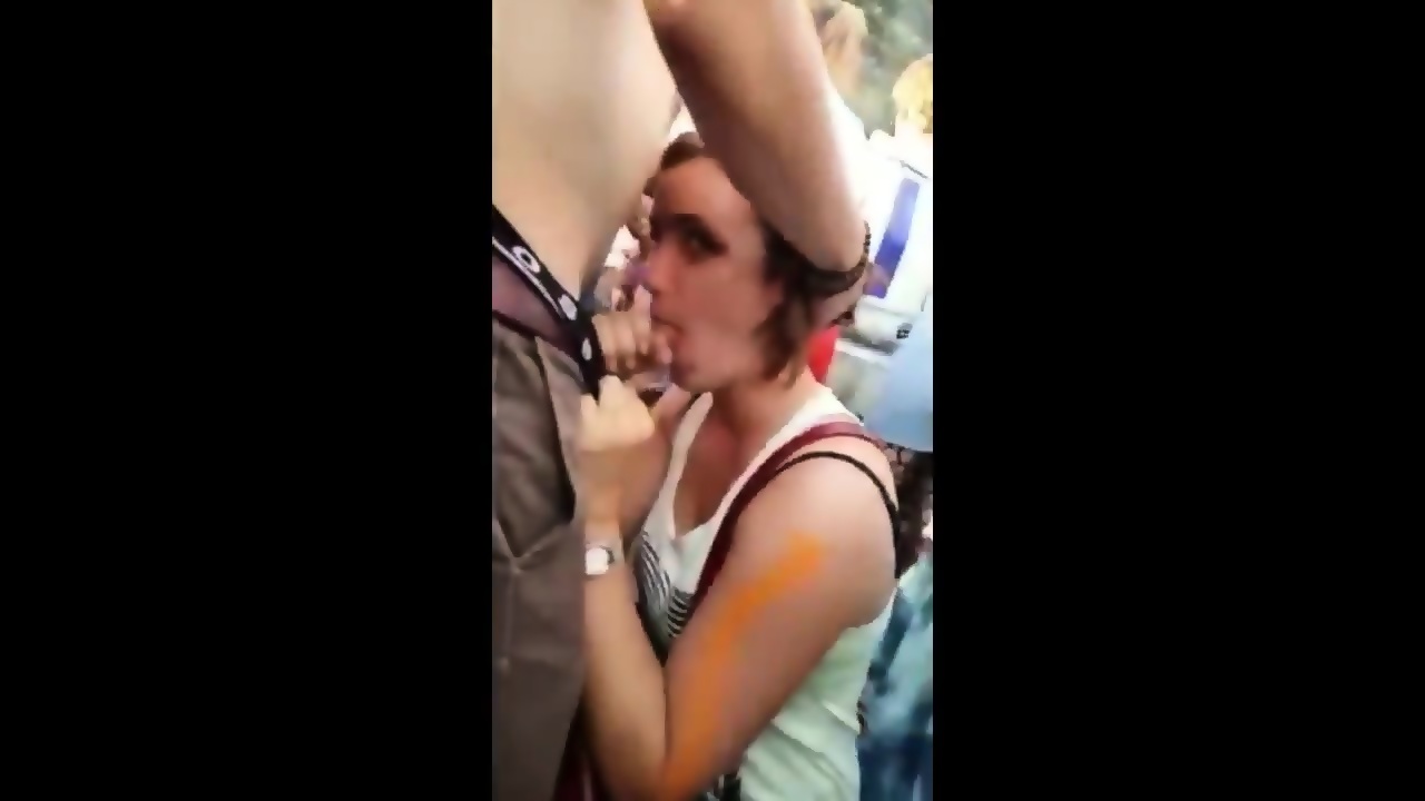 Giving DP Blowjob During A Festival image