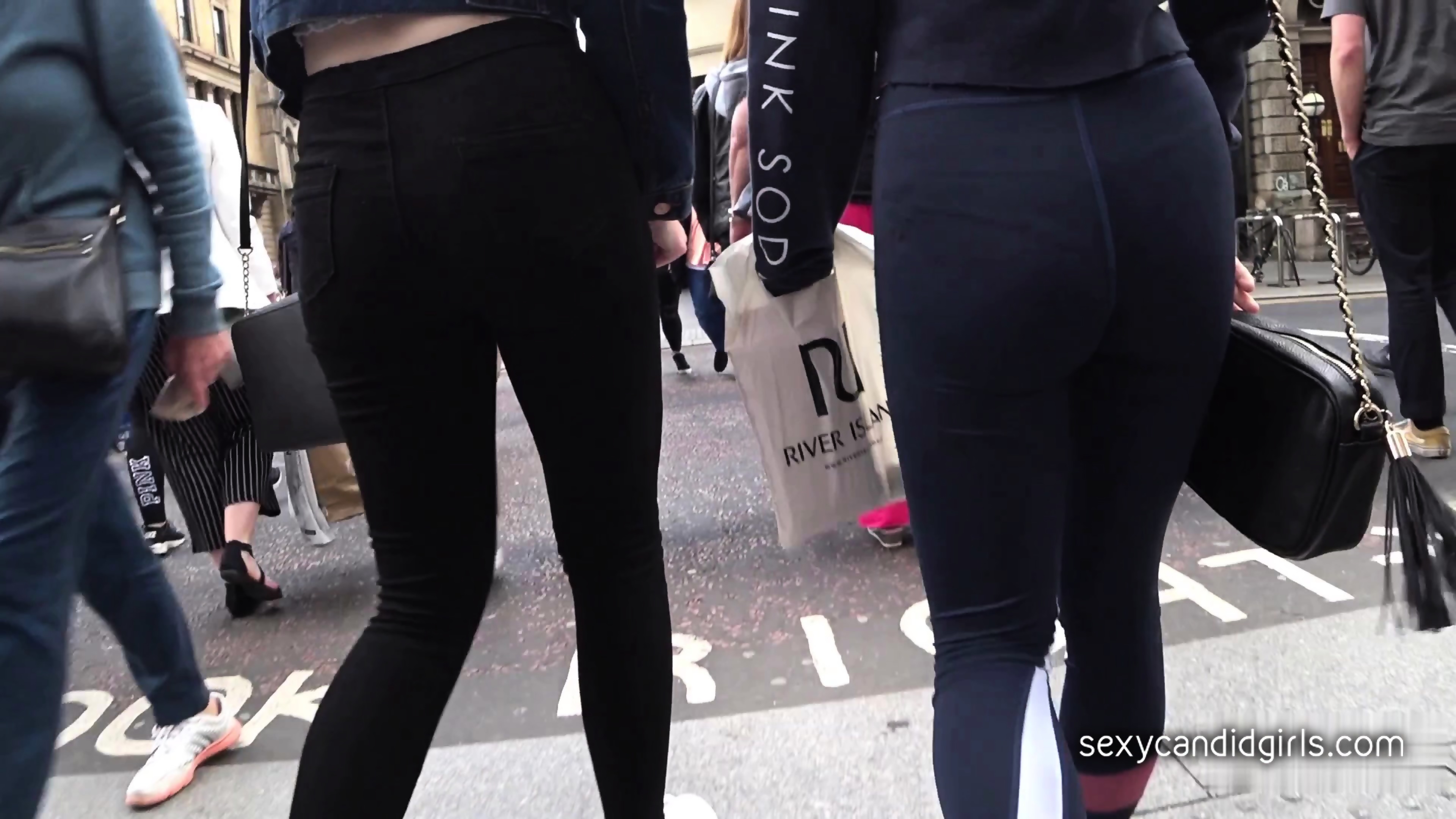 Two Candid Teens In Leggings Sexy Asses photo