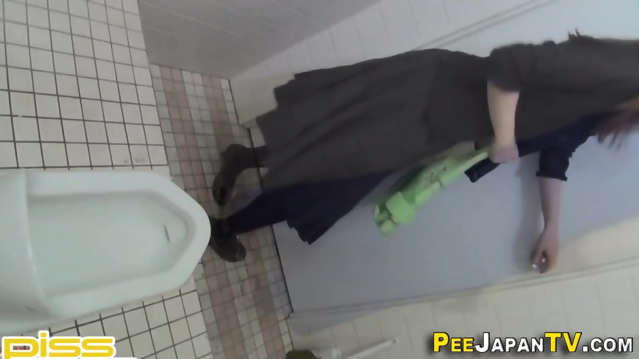Unknowing Asian Peeing In Toilet image photo